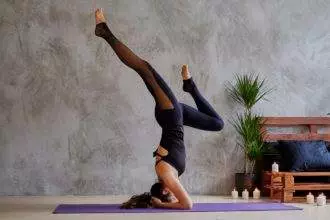 Female doing yoga Pilates.